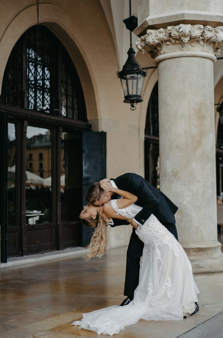 Bride and groom sharing a kiss on their wedding day