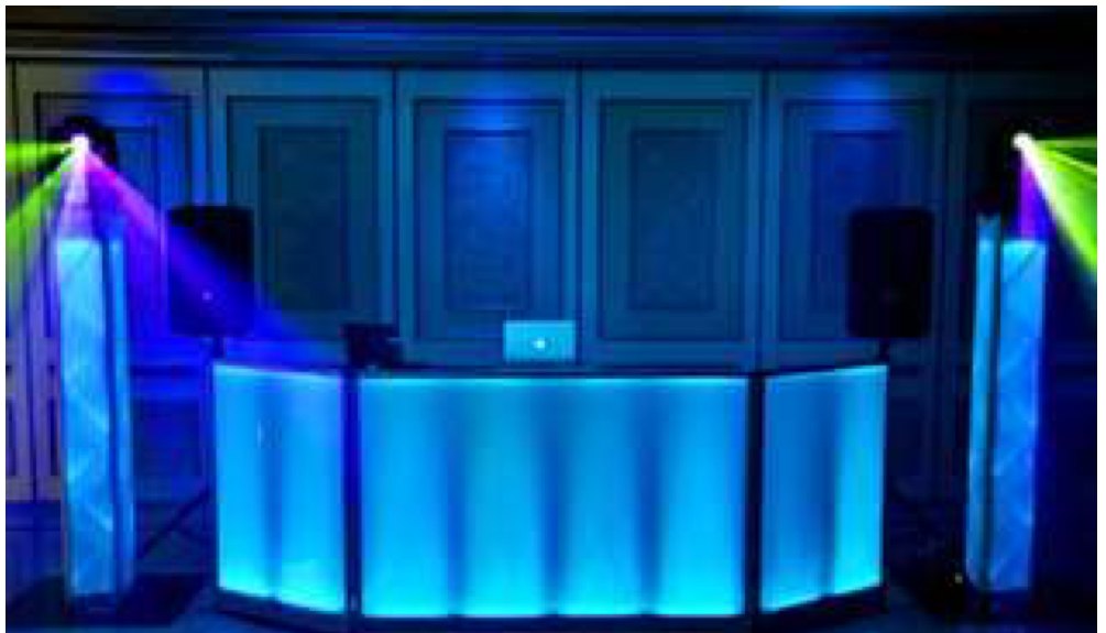 Classic DJ package setup with LED DJ booth and dance-floor lighting at a Total DJs reception